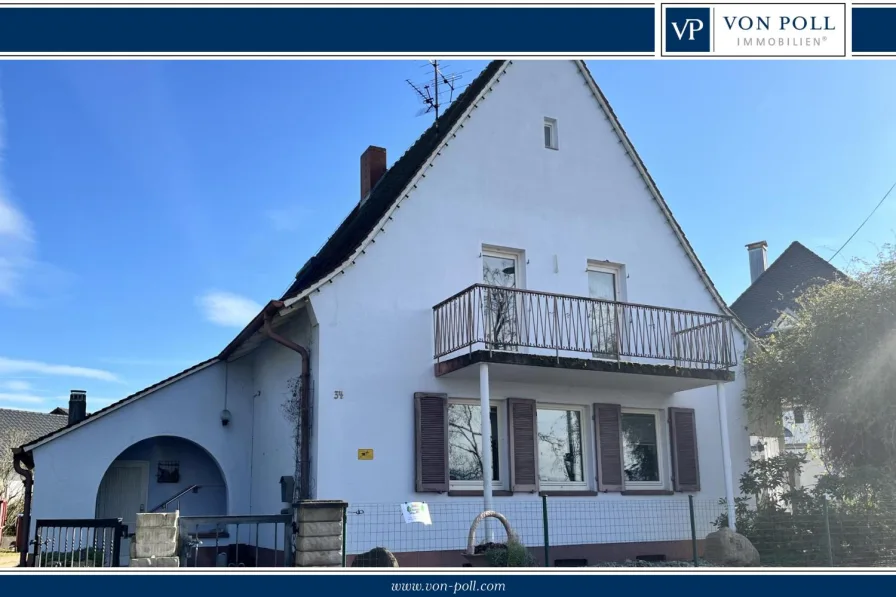  - Haus kaufen in Neuenburg am Rhein - Großes Grundstück mit Zweifamilienhaus und Garage in bester Oberstadtlage