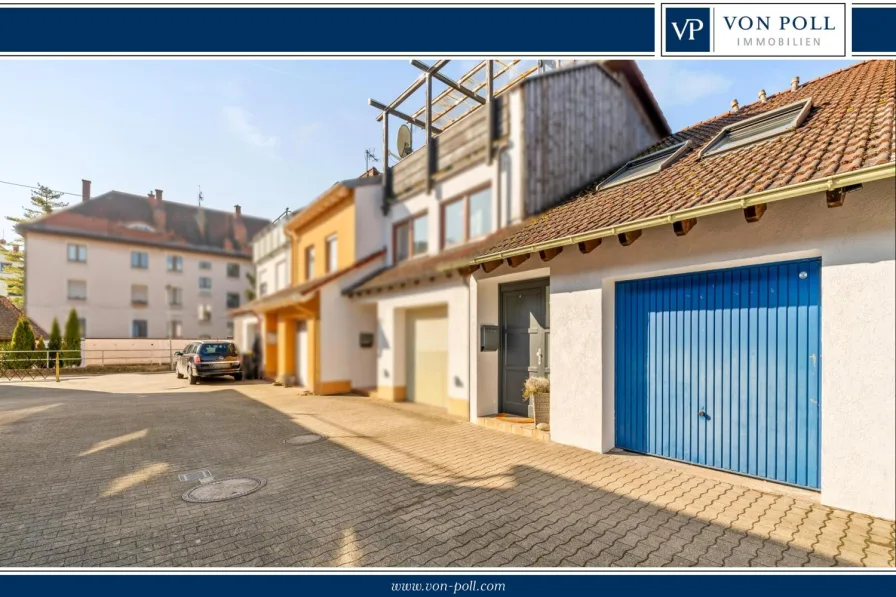 VonPoll-Neuenburg-RH-01 - Haus kaufen in Neuenburg am Rhein - Reihenmittelhaus in Oberstadtlage mit Terrasse und Garage