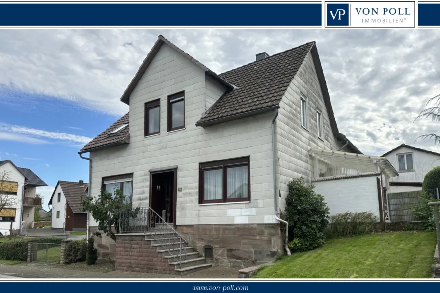 Titelbild I - Haus kaufen in Uslar / Kammerborn - Geräumiges Ein-Zweifamilienwohnhaus mit Panoramablick auf den Solling