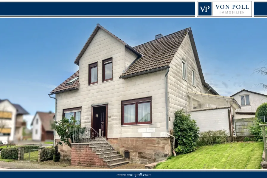 Titelbild I - Haus kaufen in Uslar / Kammerborn - Geräumiges Ein-Zweifamilienwohnhaus mit Panoramablick auf den Solling