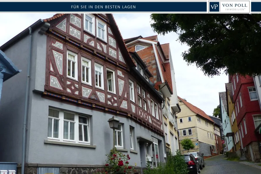 Titelbild Seitenansicht - Haus kaufen in Homberg (Ohm) - Renditestarkes Anlageobjekt im Herzen von Homberg (Ohm)