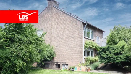 Gartenseite - Haus kaufen in Voerde - Ein Haus für 2 Familien mit großem Garten - zentrumsnah in Voerde