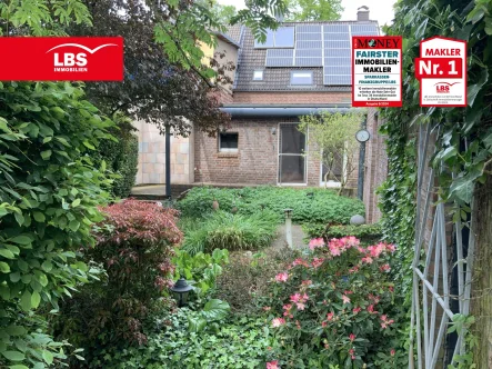 Garten überdachte Terrasse - Haus kaufen in Rheinberg - Gemütliche Doppelhaushälfte mit großem Garten in Rheinberg-Millingen