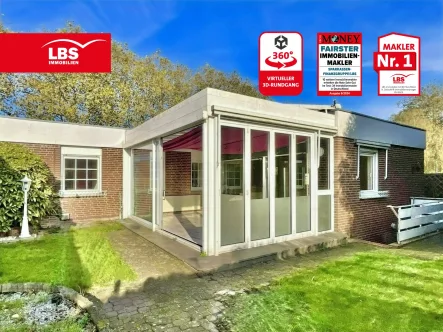 Gartenansicht mit Wintergarten - Haus kaufen in Kleve - Familienfreundlicher Bungalow mit Wintergarten