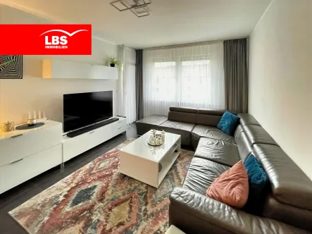 Wohnzimmer - Wohnung kaufen in Oberhausen - Traumwohnung in Tackenberg: frisch saniert, in einer ruhigen Lage