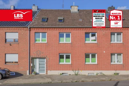 Hausansicht - Haus kaufen in Gangelt - Modernisiertes Reihenmittelhaus mit Potenzial für Renovierung! 