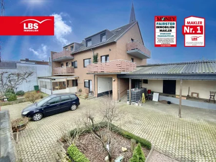 Ihr neues zu Hause! - Haus kaufen in Grevenbroich - Mehrfamilienhaus mit zwei freien Wohnungen im Erdgeschoss & 1. Obergeschoss