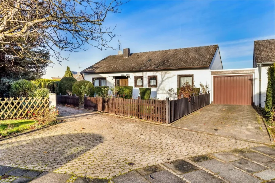 Eine gepflegte Immobilie - Haus kaufen in Swisttal - Dieses gepflegte Einfamilienhaus in traumhaft schönem Garten kann bald ihr Eigen sein!