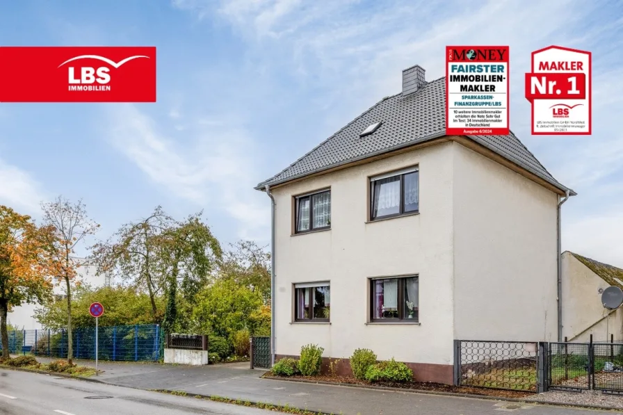 Seitenansicht - Haus kaufen in Langenfeld - Einfamilienhaus mit  innenliegenden Hof in Richrath!