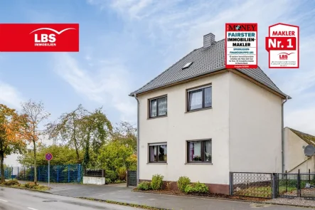 Seitenansicht - Haus kaufen in Langenfeld - Einfamilienhaus mit  innenliegenden Hof in Richrath!