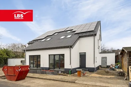 Außenansicht - Haus mieten in Langenfeld - *NEUBAU*,  KFN klimafreundlicher Neubau 40, * ERSTBEZUG* 18,- Euro / pro qm