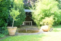 Pergola und Springbrunnen