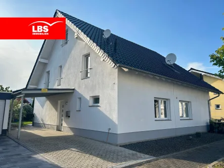 Frontansicht - Haus kaufen in Köln - Charmante Doppelhaushälfte mit Wohlfühlgarantie