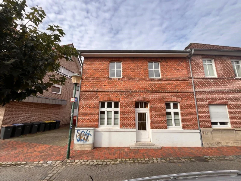 Hausfront - Haus kaufen in Velen - Doppelhaushälfte in besonderer Lage von Ramsdorf zu verkaufen! 