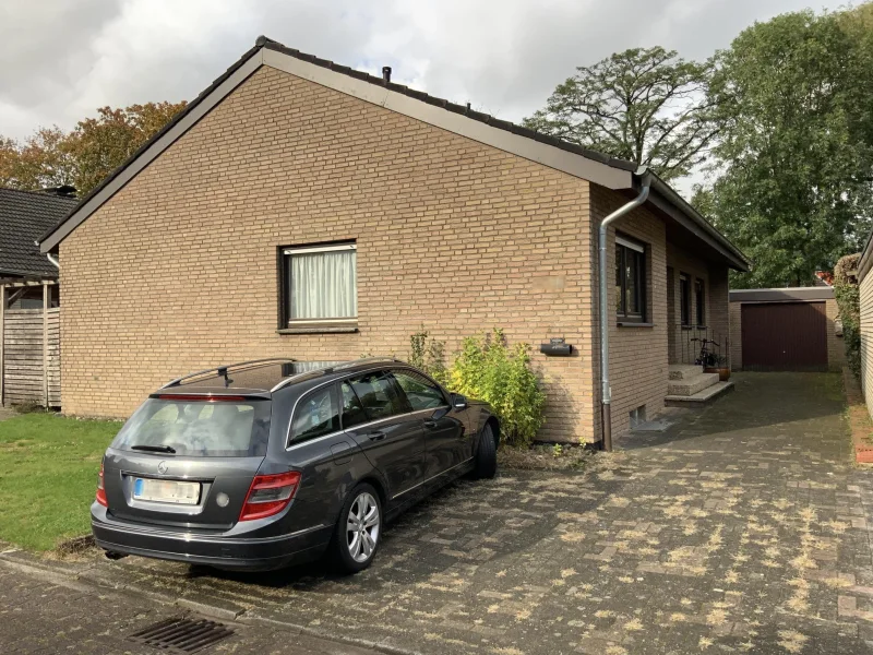 Außenansicht - Haus kaufen in Coesfeld - Bungalow in einmalig ruhiger Sackgassenlage am Fuße des Coesfeld Bergs. 