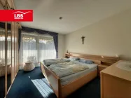 Schlafzimmer mit Balkonzugang 