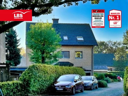 Hausansicht  - Wohnung kaufen in Dorsten - 3,5 Raum Eigentumswohnung mit großer Loggia und Garage in Dorsten-Rhade