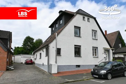 Außenansicht - Haus kaufen in Oer-Erkenschwick - Gepflegte Doppelhaushälfte mit großem Garten und Garage!