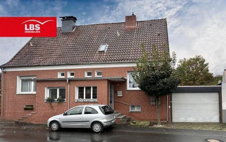 Frontansicht - Haus kaufen in Ahlen - Große Doppelhaushälfte mit viel Potential im Ahlener Osten!!