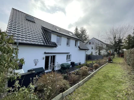 Gartenseite - Haus kaufen in Melle - Viel Platz für die Familie - Großzügiges Dreifamilienhausin Melle