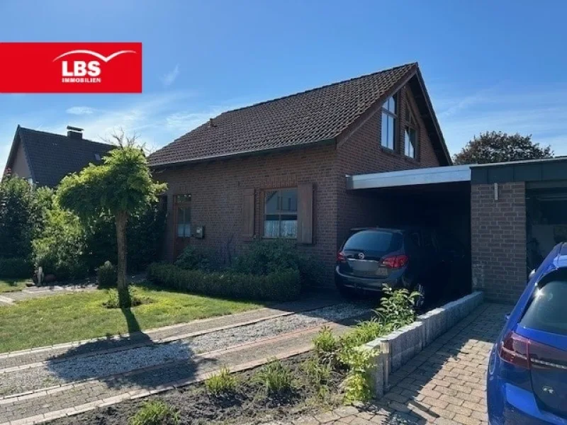 Frontansicht - Haus kaufen in Sassenberg - Schnuckeliges Haus sucht kleine Familie in Füchtorf