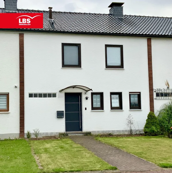 Vorderansicht - Haus kaufen in Holzwickede - Modernisiertes Reihenmittelhaus wartet auf neue Eigentümer