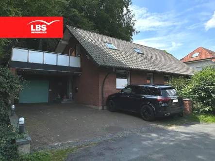 Frontansicht - Haus kaufen in Bünde - Familienglück im Grünen