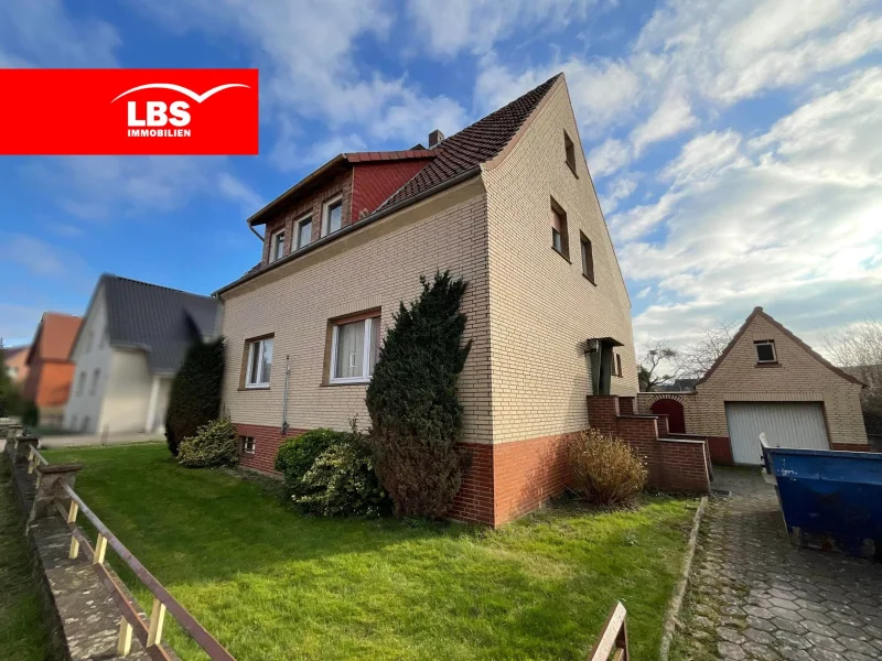 Straßenansicht - Haus kaufen in Minden - Reserviert! Ein- bis Zweifamilienhaus wartet auf den passenden Handwerker!