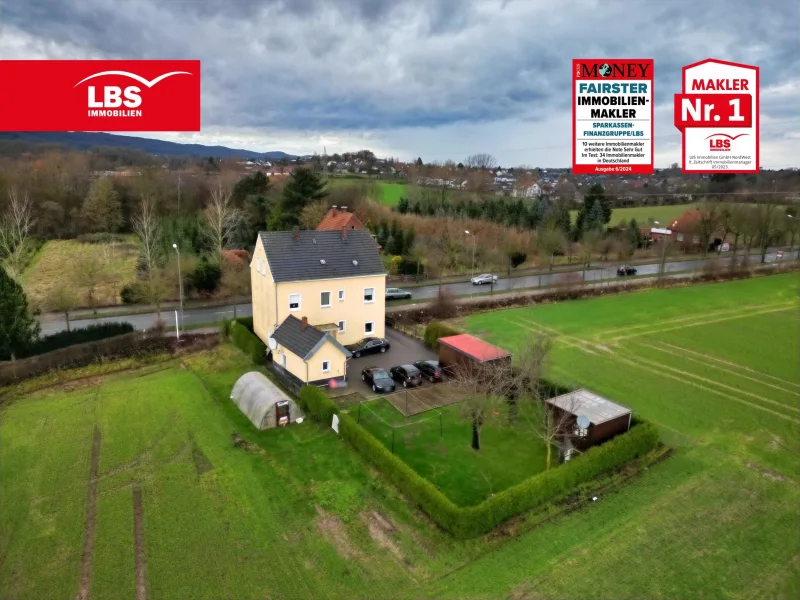 Gartenansicht - Haus kaufen in Minden - Attraktives Mehrfamilienhaus in Toplage…