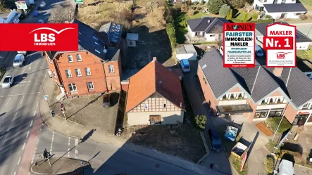 Bauland und Objekt - Grundstück kaufen in Porta Westfalica - Baugrundstück mit "Wohnhaus"