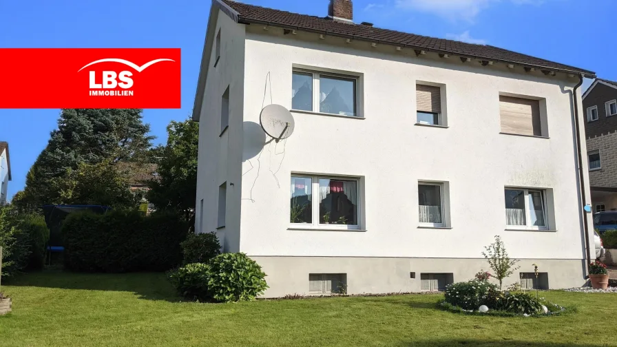 Titelbild - Haus kaufen in Dörentrup - Zweifamilienhaus mit Barrierefreiem EG in ruhiger Lage - Derzeit vermietet