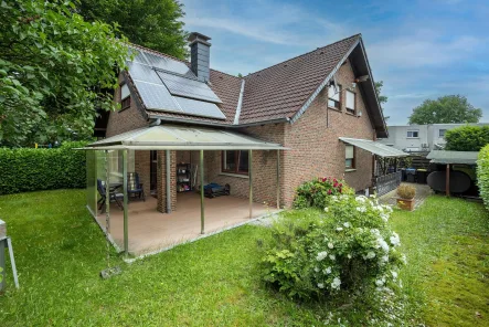 Außenansicht, Gartenseite - Haus kaufen in Dorsten - Familie gesucht! Haus mit Erdwärme, Solar, Photovoltaik und 2 Garagen
