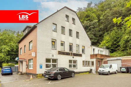 Außenansicht - Haus kaufen in Hagen - 5-Mehrfamilienhaus mit Gewerbefläche und viel Potenzial, Faktor 11