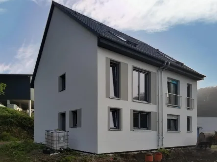 Hausansicht - Haus kaufen in Ennepetal - Doppelhaushälfte als Ausbauhaus in Ennepetal