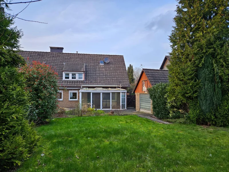 Hausrückansicht - Haus kaufen in Dortmund - Doppelhaushälfte mit Garten und Wintergarten! 