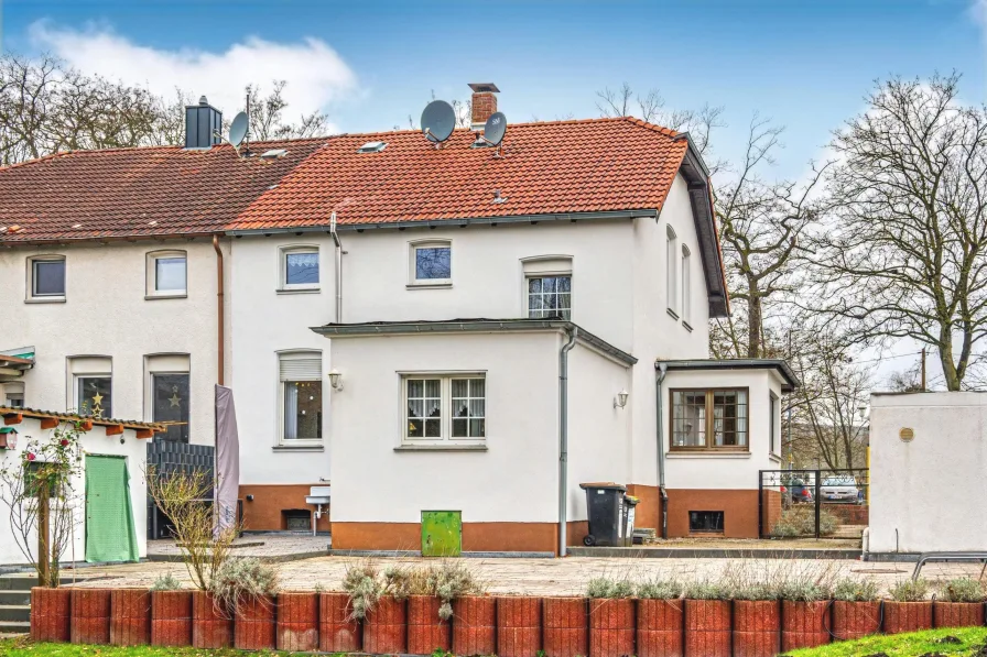 Rückansicht - Haus kaufen in Recklinghausen - Doppelhaushälfte in Recklinghausen: Modernisiert im historischen Stil