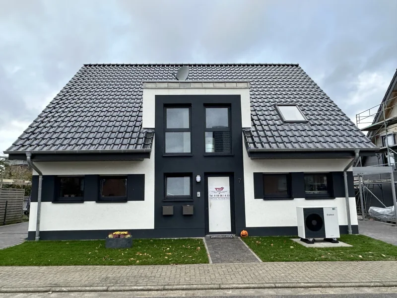 Außen - Wohnung kaufen in Steinfurt - Etagenwohnung mit Ausbaureserve! Neubau in TOP Lage von Burgsteinfurt! 