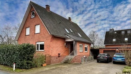 Hausansicht - Haus kaufen in Hollern-Twielenfleth - Solide Doppelhaushälfte nähe Elbdeich!