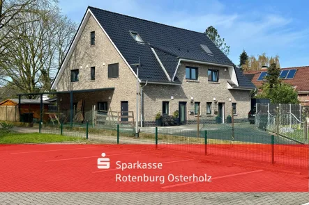 Rechte Hausseite - Haus kaufen in Osterholz-Scharmbeck - Mitten in der Stadt! KfW55 mit 175 m² Wohnfläche und 6 Zimmern 