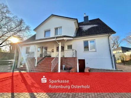 Front - Haus kaufen in Rotenburg - Charmante Doppelhaushälfte mit viel Platz und moderner Ausstattung 