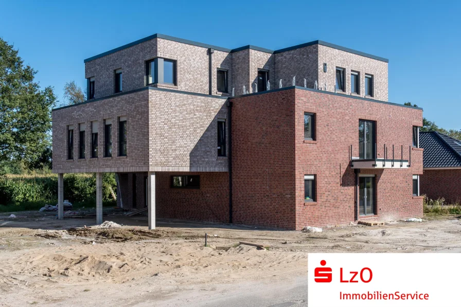 Außenansicht - Wohnung kaufen in Apen - Kapitalanlage! KfW-40-Plus Neubauwohnungen in TOP-Lage von Augustfehn