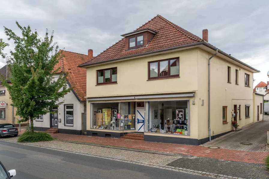 Straßenansicht - Haus kaufen in Harpstedt - Wohn- und Geschäftshaus in Harpstedt 