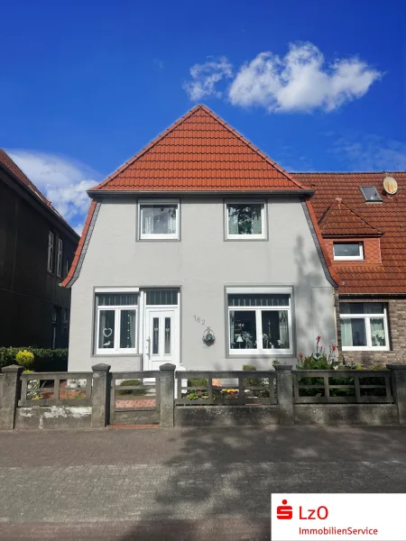 Außenansicht - Haus kaufen in Delmenhorst - Schönes Reihenendhaus in zentraler Lage  