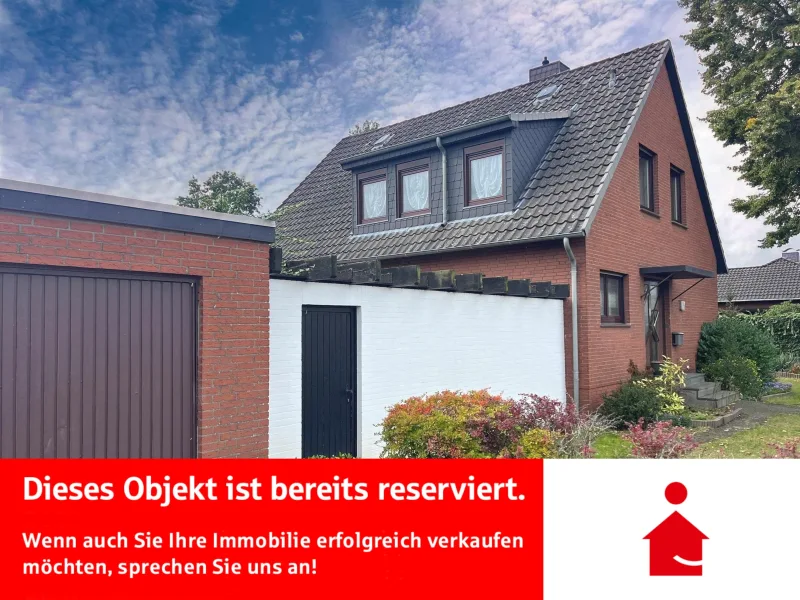 Außenansicht - Haus kaufen in Delmenhorst - Einfamilienhaus mit Doppelgarage in beliebter Wohnlage 
