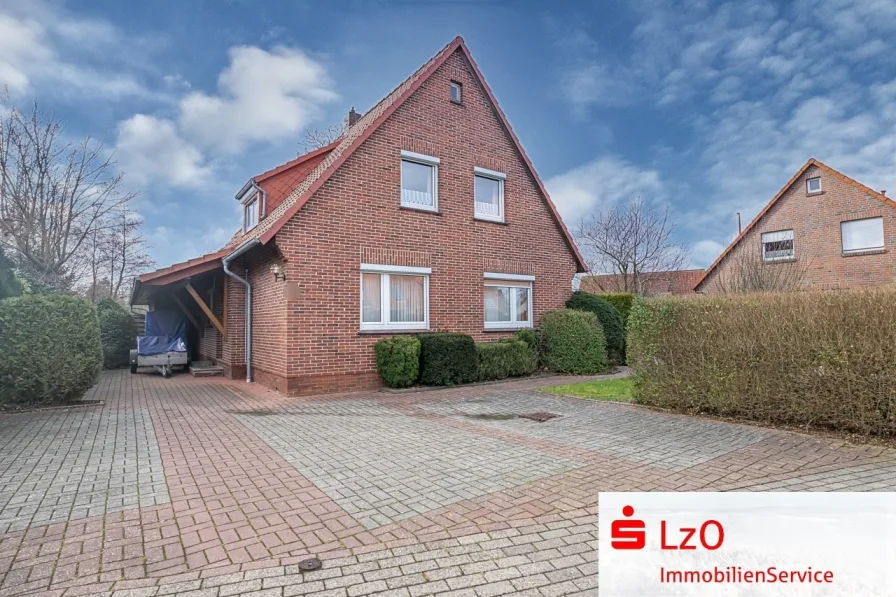 Außenansicht - Haus kaufen in Butjadingen - Traumhaft gelegenes Einfamilienhaus an der Nordsee!