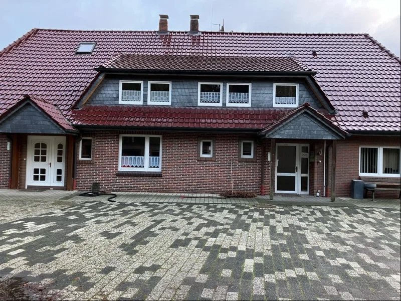 Eingang Wohnhaus + Büro - Sonstige Immobilie kaufen in Edewecht - Wohn- und Geschäftshaus mit Hallen- und Lagerflächen