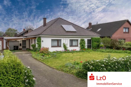 Außenansicht - Haus kaufen in Westerstede - Großzügiger Bungalow in zentraler Lage von Ocholt