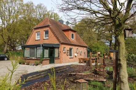  - Haus kaufen in Wardenburg - Modernisiertes Einfamilienhaus mit Wintergarten