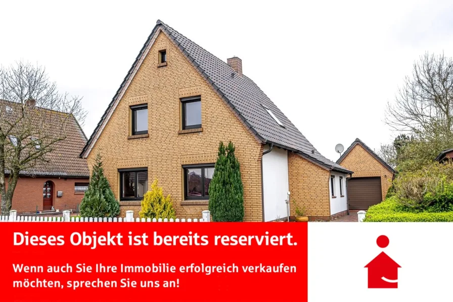 Außenansicht - Haus kaufen in Stadland - Reserviert! Top Siedlungshaus in schöner gewachsener Lage!