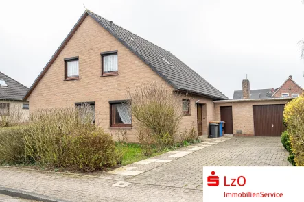Außenansicht - Haus kaufen in Wangerland - Charmantes Einfamilienhaus mit großem Grundstück in Hooksiel